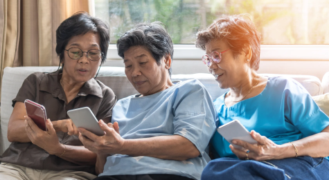 Sisterhood Planet Community | Three Asian women on their phones